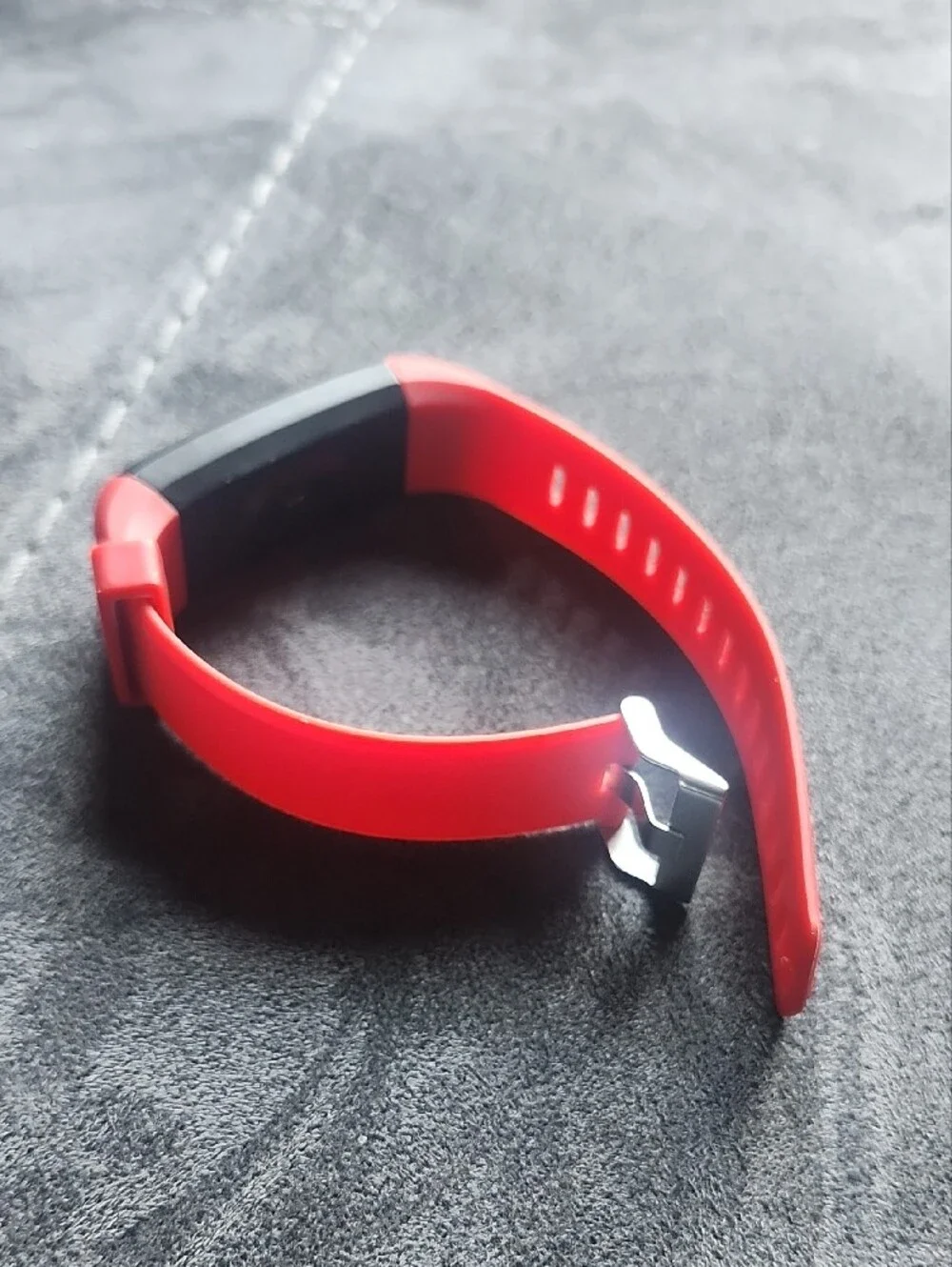 Red Fitness Tracker Wristband with Black Display